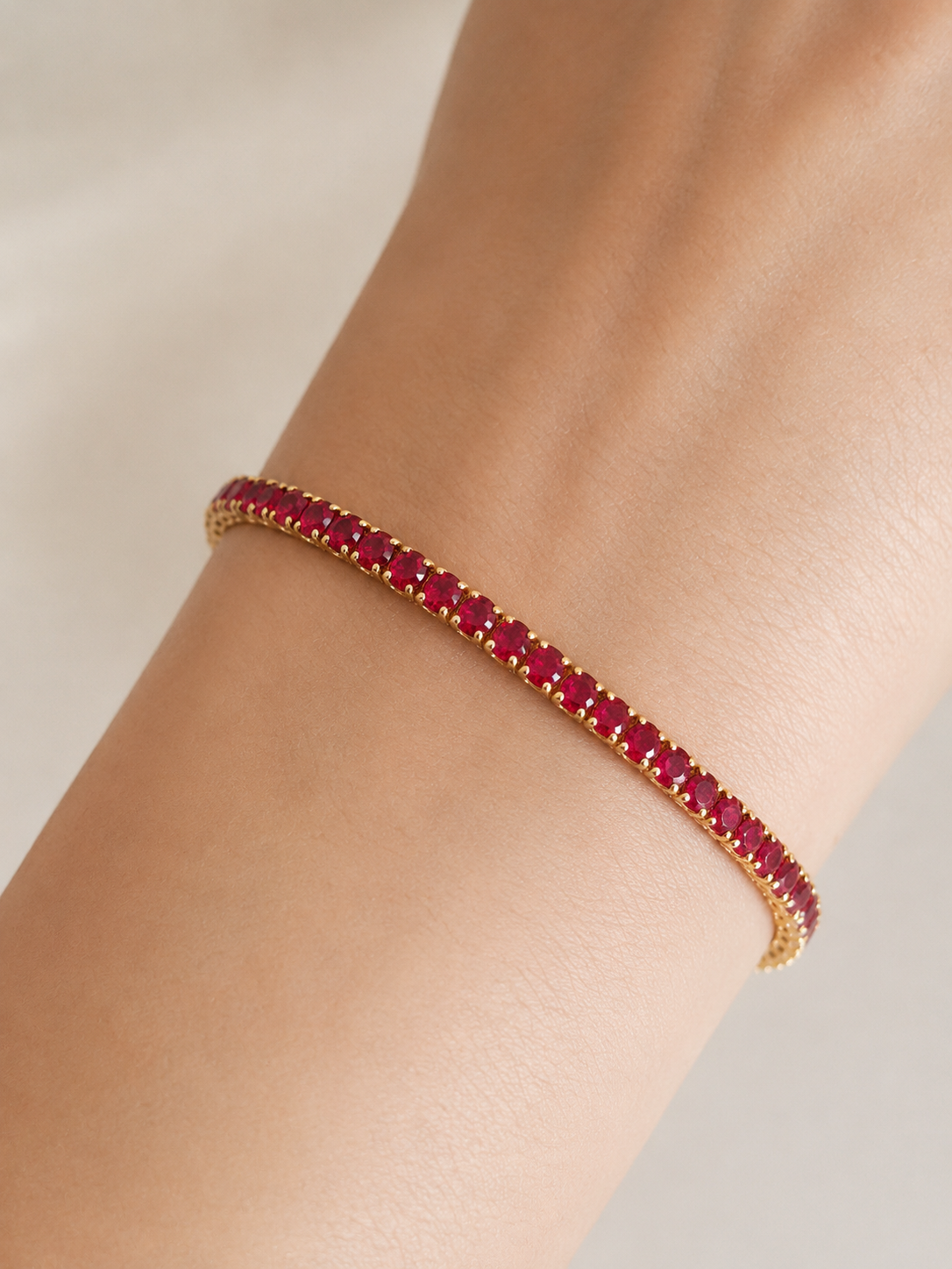 Bracciale Tennis 3 mm in argento 925 con zirconi rossi e finitura placcata oro
